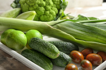Various fresh vegetables on tray, closeup