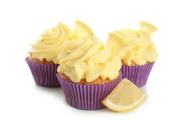Delicious lemon cupcakes on white background