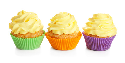 Delicious lemon cupcakes on white background