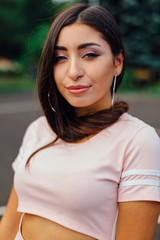 Fototapeta premium Portrait of a young attractive middle eastern woman with long hair