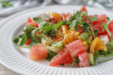 Delicious watermelon salad on plate, closeup
