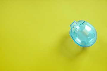 Cute piggy bank on color background