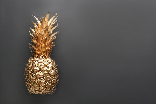 Golden Pineapple On Black Background