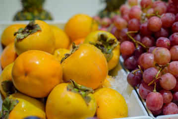 persimmons and grapes