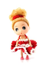beautiful baby doll with red dress isolated on white background