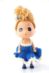 beautiful baby doll with blue dress isolated on white background