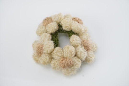 handmade knitting crochet flowers isolated on white background