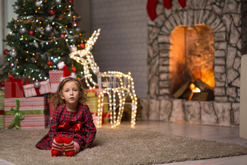 Girl in a dress meets christmas