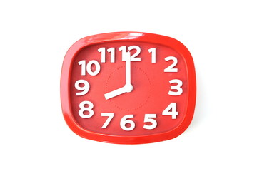 red alarm clock isolated on white background