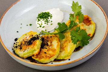 Hot zucchini pancakes