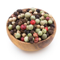 Pepper mix seed on spoon on white background.