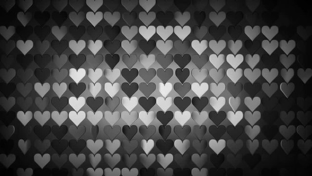 Array of black heart shapes. Abstract romantic motion background. Seamless loop 3D render animation 4k UHD 3840x2160
