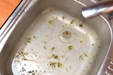 The sink in the kitchen is clogged and the water does not go down the drain. Clogged sink