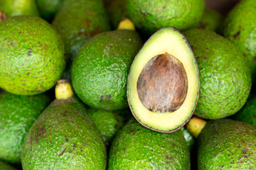 Avocado in the market. Avocado background.