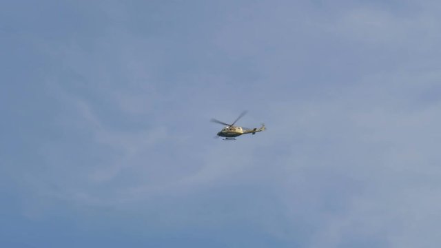 A helicopter flying in the sky