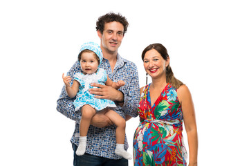 Pregnant woman with her little girl and her husband on isolated white background