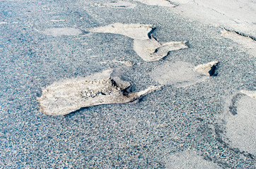 pothole on asphalt road