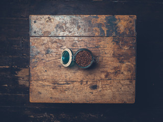 Coffee beans in jar on table