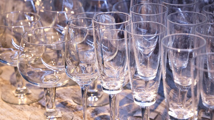 close up of many different wine glasses and stemware