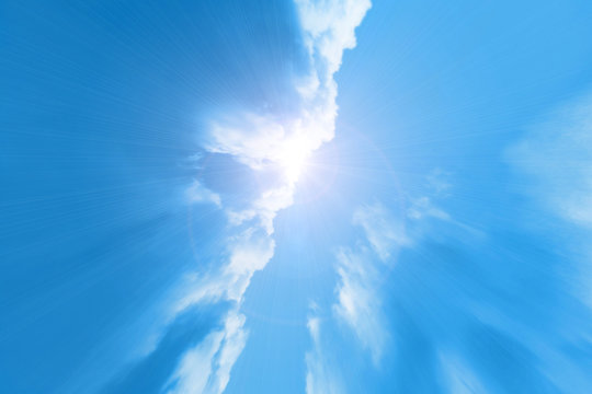 sky background with clouds and sun beams