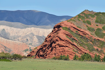 Beautiful red sandstone rocks Seven bulls in Jeti Oguz canyon,famous natural landmark of...