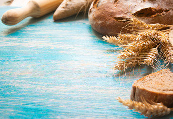 Rustic food background with fresh homemade bread