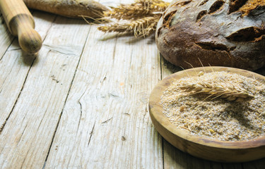 Rustic food background with fresh homemade bread