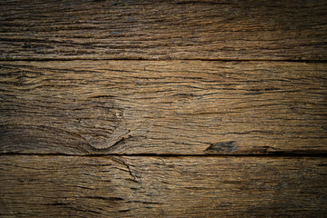 Old natural antique teak wooden background shows natural peel off tree skin texture surface of the tree. Seen in close up view from the top. Natural wooden background concept.