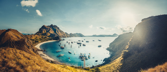 Mountains, bay, sun rays. Aerial shot. Padar. Wonderful panoramic overview the cute bay with the...