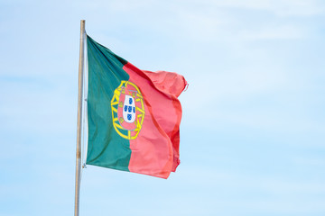 Portuguese flag waving on the strong wind