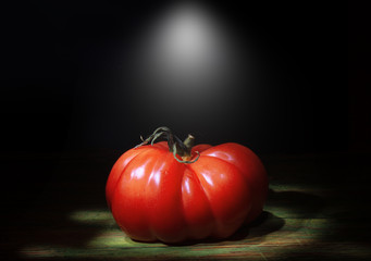 Rustic food background with fresh tomato