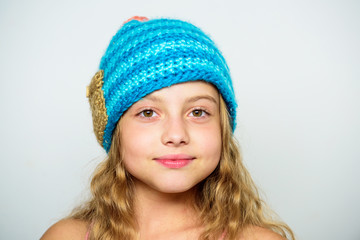 Difference between knitting and crochet. Free knitting patterns. Fall winter season accessory. Childrens knitted hats. Girl long hair happy face white background. Kid wear warm soft knitted blue hat