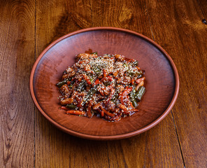 Stewed vegetables are seasoned with sesame seeds