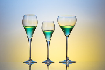three glasses with cocktails