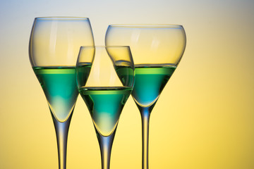 three glasses with cocktails
