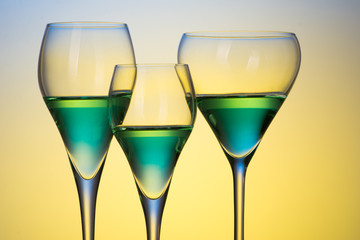 three glasses with cocktails