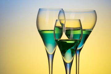 three glasses with cocktails