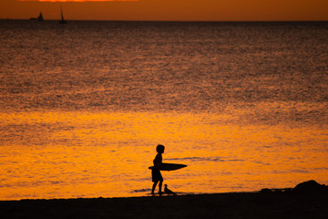 Landscape of silhouettes persons orange colors and contrast