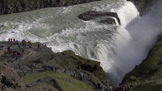 Gullfoss waterfall and tourists in Iceland