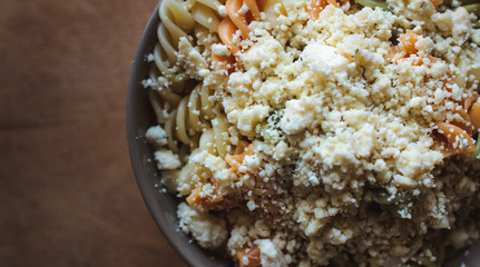 Tri color fusilli with cheese with dill