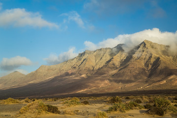 Mountains with blue sky and white clouds in Cofete, Fuerteventura.