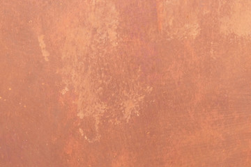 The texture of an orange natural poszarpane walls, metal old painted surface