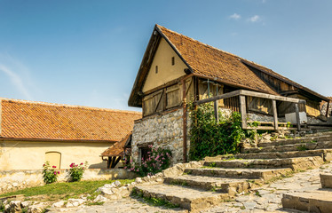 Fototapeta na wymiar Ancient houses in the ancient fortress of Rasnov, Romania