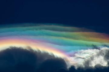 Amazing rainbow cloud on the sky.