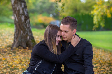 Funny couple laughing with a white perfect smile
