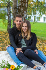 Fototapeta na wymiar Funny couple laughing with a white perfect smile