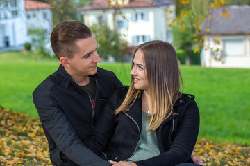 Funny couple laughing with a white perfect smile