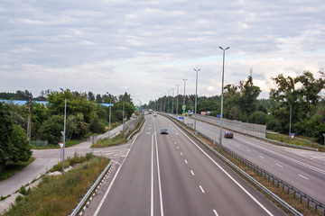 Fototapeta na wymiar highway with cars on road