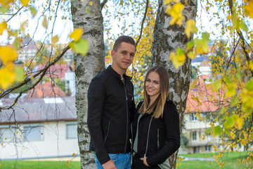 Funny couple laughing with a white perfect smile
