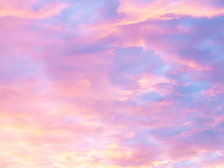 Naklejka na ściany i meble Colorful, pastel clouds at sunset